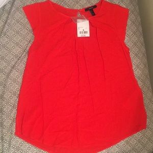Bright red blouse